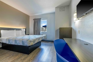 Desk, laptop workspace, blackout curtains, free WiFi