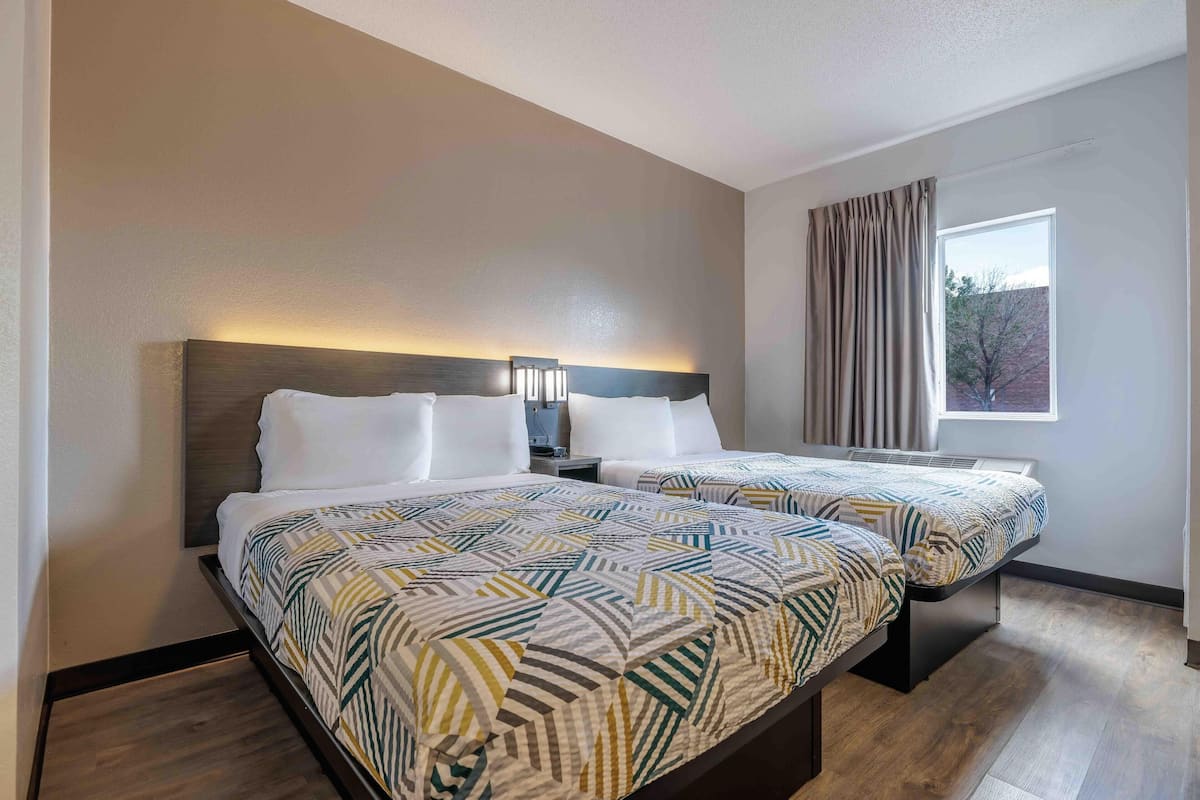 Desk, laptop workspace, blackout curtains, free WiFi
