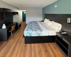 Desk, laptop workspace, blackout drapes, soundproofing