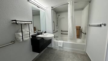 Combined shower/tub, towels, soap, toilet paper