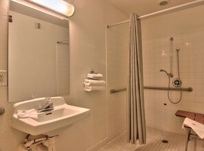 Separate tub and shower, towels