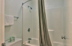 Separate tub and shower, towels