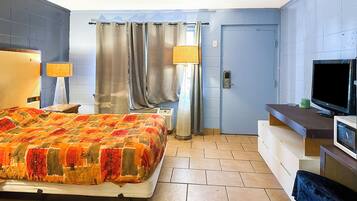 Habitación familiar, 2 camas dobles | Escritorio, wifi gratis, ropa de cama