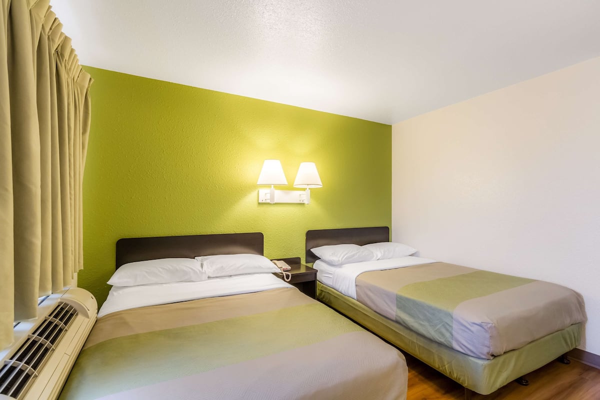 Desk, laptop workspace, free WiFi, bed sheets