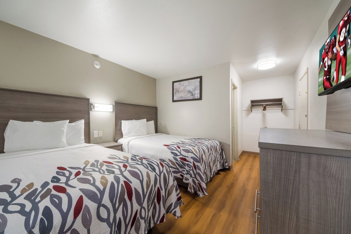 Desk, blackout drapes, cribs (free), WiFi (free)