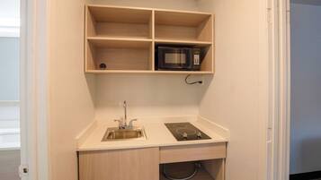 Suite, 2 Queen Beds, Non Smoking | Private kitchenette | Fridge