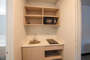 Suite, 2 Queen Beds, Non Smoking | Private kitchenette | Fridge