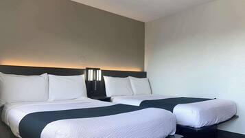 Desk, blackout drapes, free WiFi, bed sheets