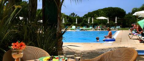 Outdoor pool, pool umbrellas, pool loungers