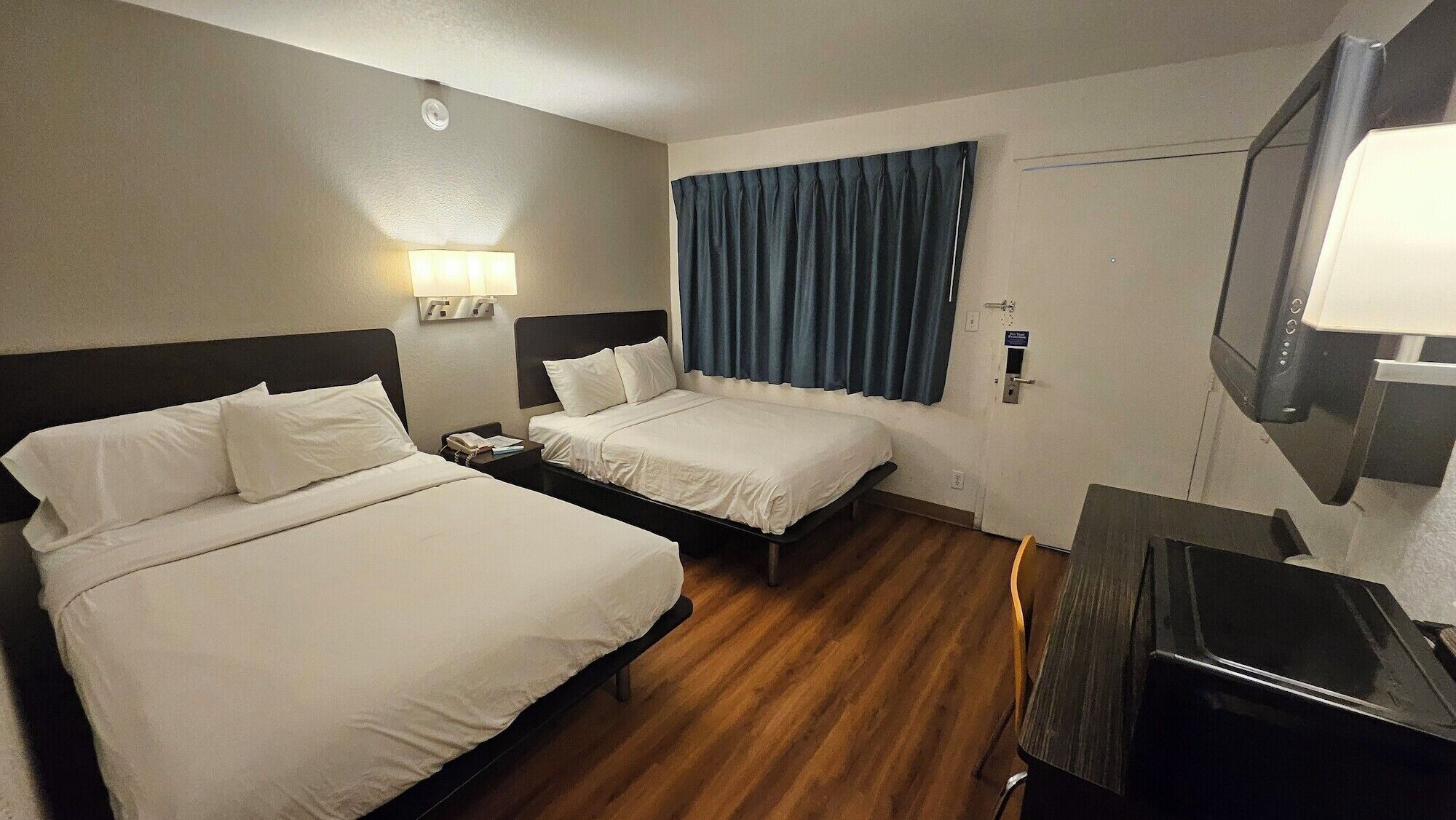 Blackout drapes, iron/ironing board, bed sheets