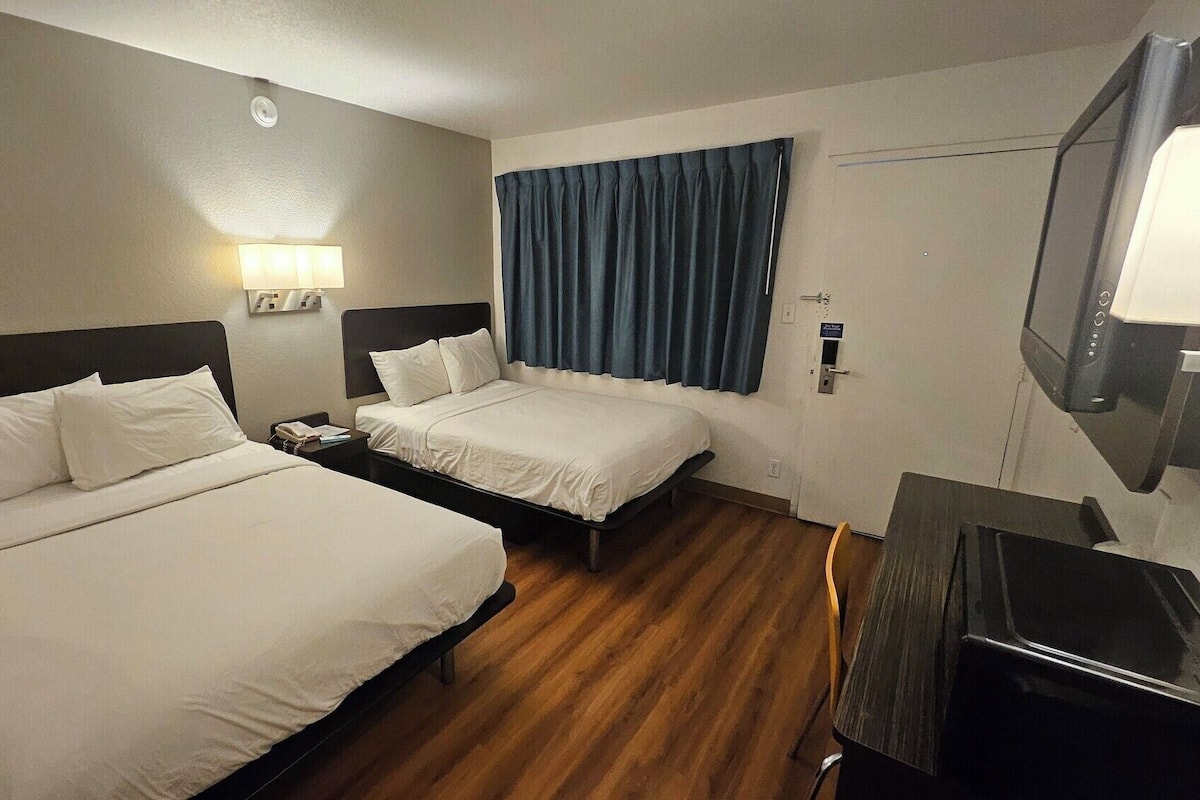 Blackout drapes, iron/ironing board, bed sheets