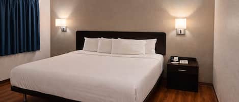 Blackout drapes, iron/ironing board, bed sheets