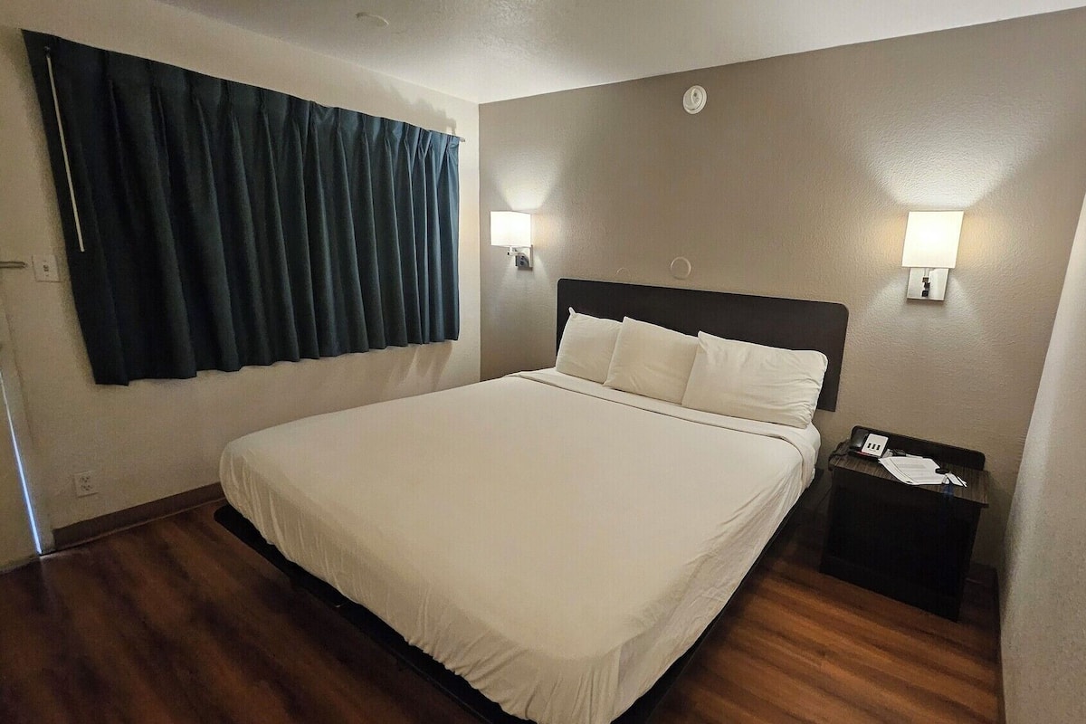 Blackout drapes, iron/ironing board, bed sheets