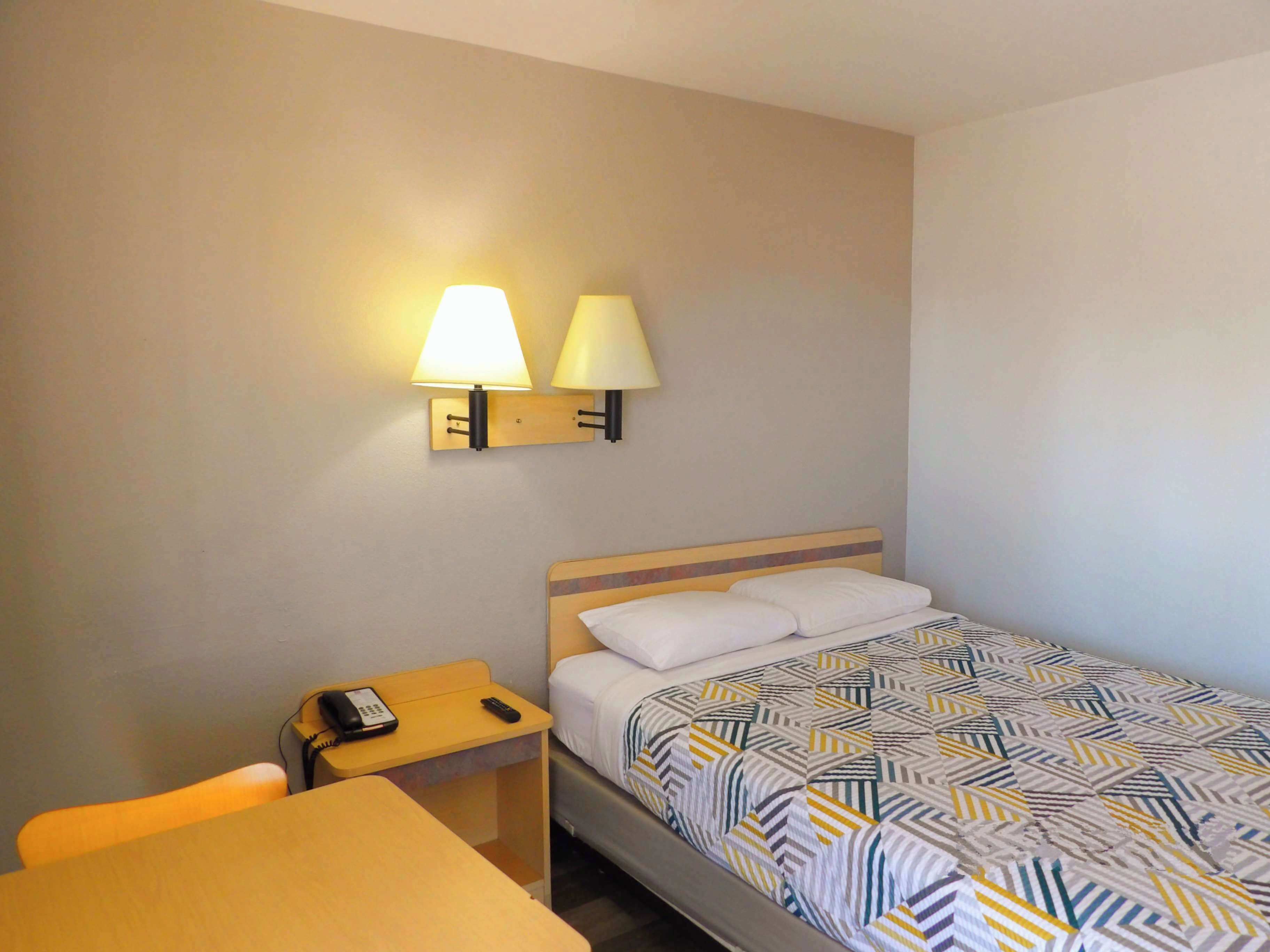 Desk, free WiFi, bed sheets