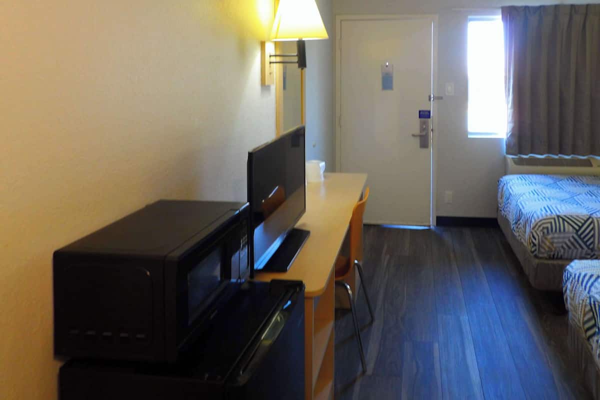 Desk, free WiFi, bed sheets