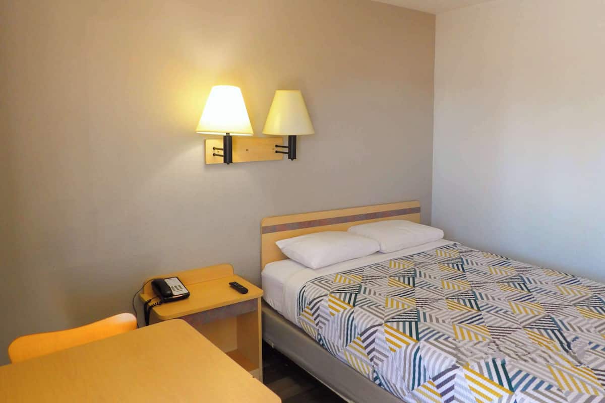 Desk, free WiFi, bed sheets