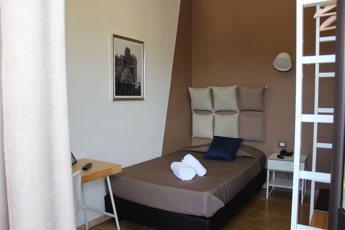 Premium bedding, down duvets, Select Comfort beds, in-room safe