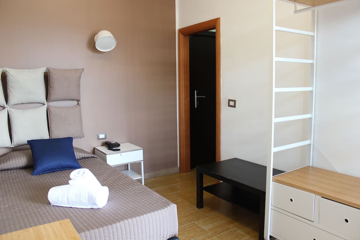Premium bedding, down duvets, Select Comfort beds, in-room safe