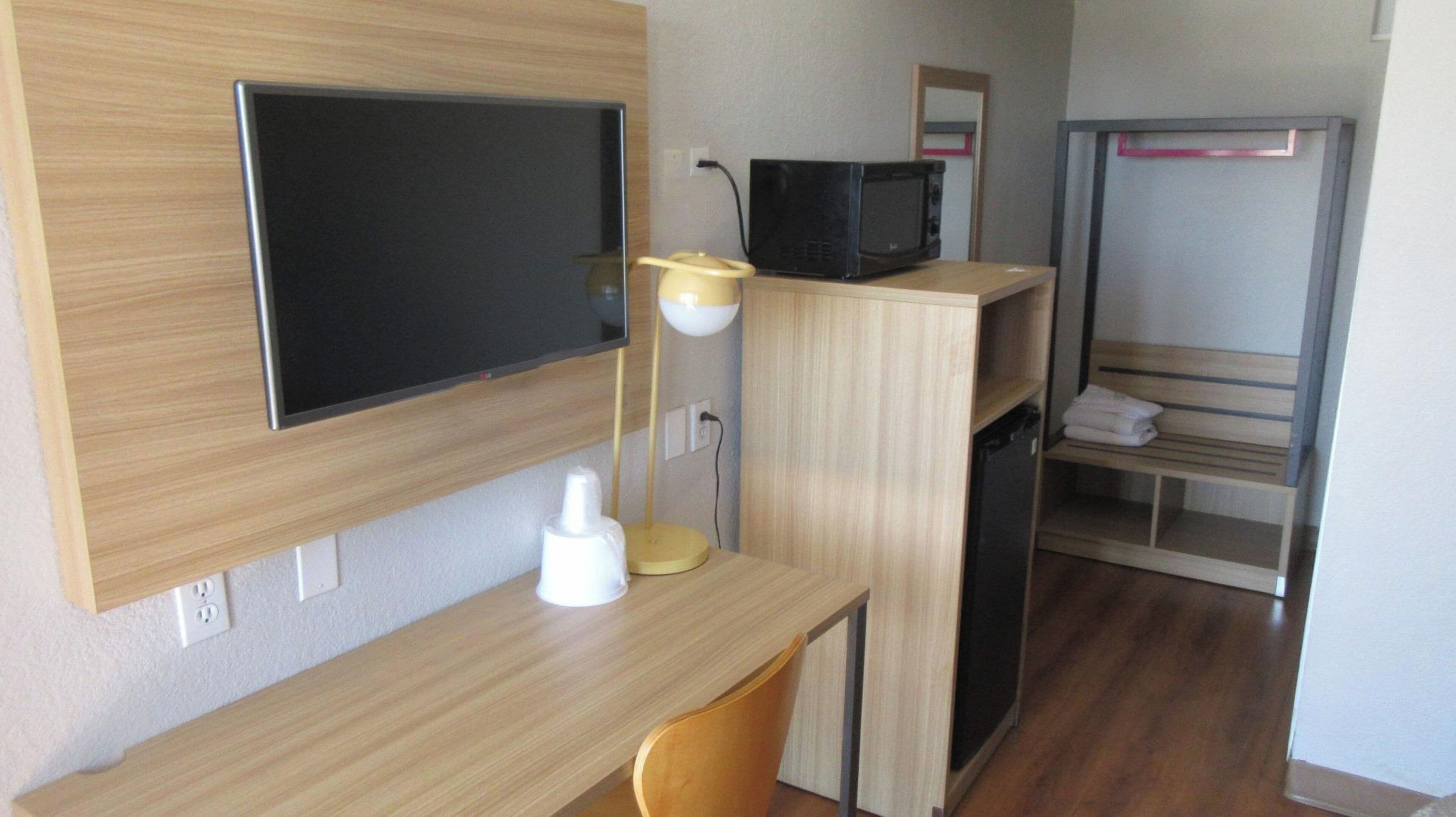 Desk, free WiFi, bed sheets, alarm clocks