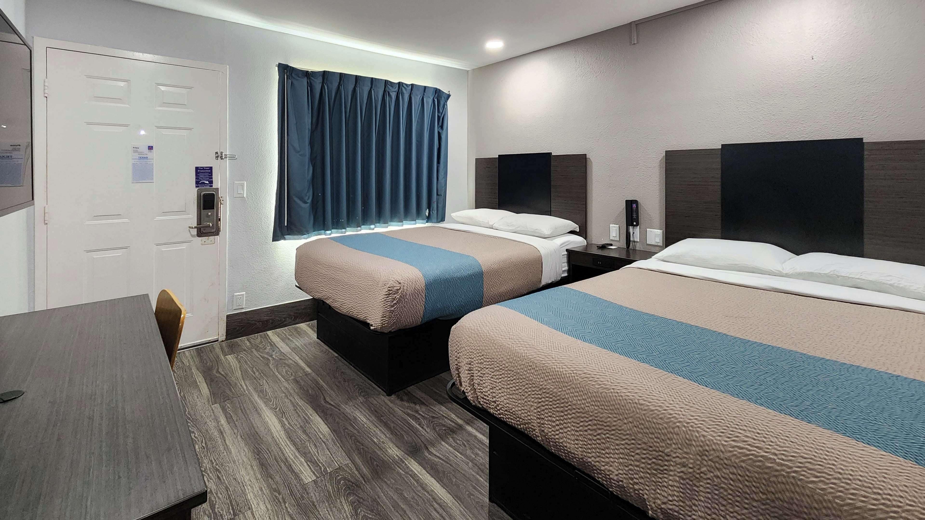 Desk, laptop workspace, free WiFi, bed sheets