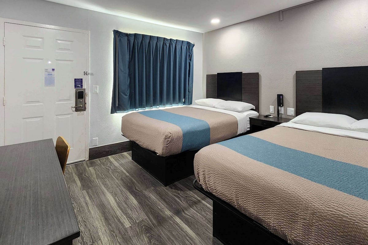 Desk, laptop workspace, free WiFi, bed sheets