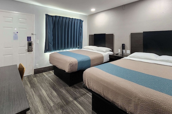 Desk, laptop workspace, free WiFi, bed sheets