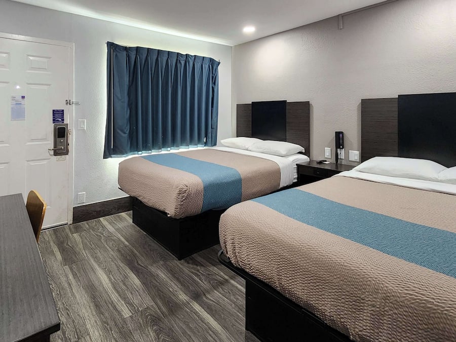 Desk, laptop workspace, free WiFi, bed sheets