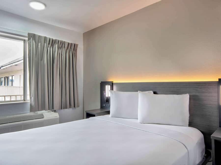 Wi-Fi de cortesia, roupa de cama