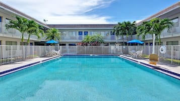 Outdoor pool, open 9:00 AM to 9:00 PM, pool umbrellas