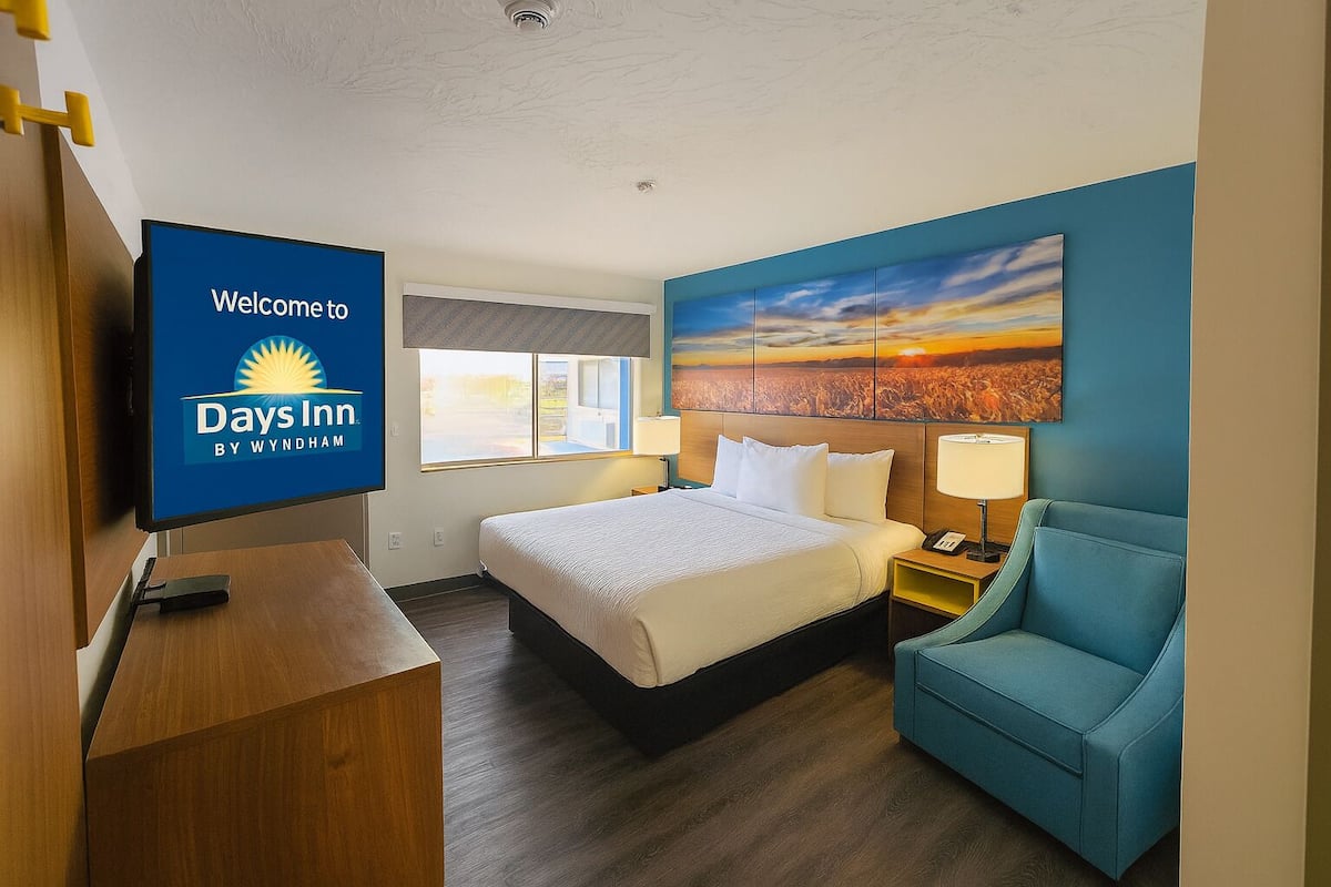 Premium bedding, desk, laptop workspace, free WiFi