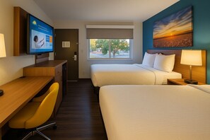 Premium bedding, desk, laptop workspace, free WiFi