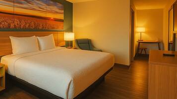 Premium bedding, desk, laptop workspace, free WiFi