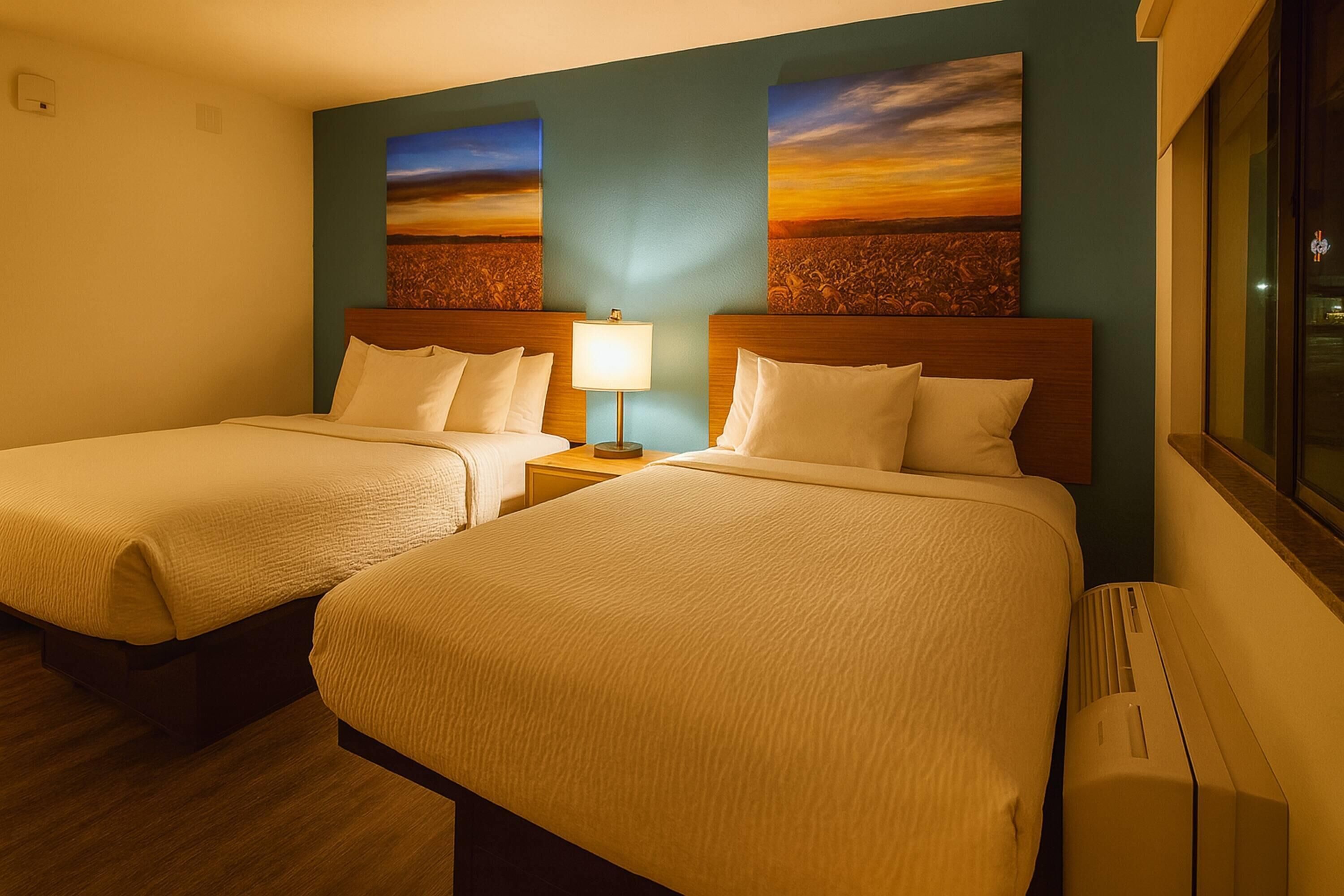 Premium bedding, desk, laptop workspace, free WiFi