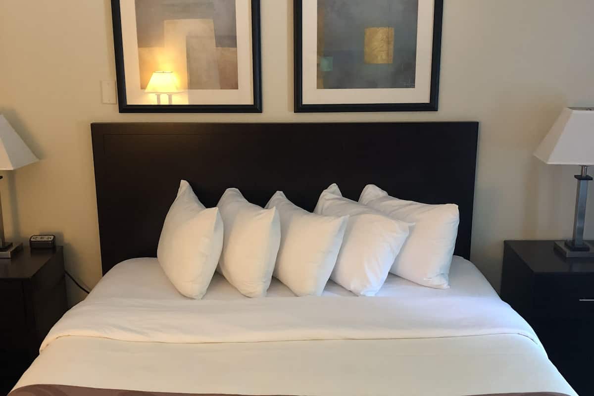 desk, laptop workspace, blackout curtains, iron/ironing board