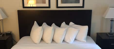 Desk, laptop workspace, blackout curtains, iron/ironing board