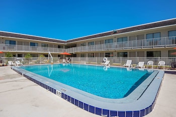 Outdoor pool at Rodeway Inn Kissimmee Maingate West