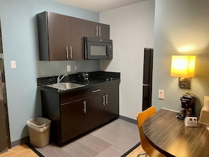 Fridge, microwave, stovetop, cookware/dishes/utensils