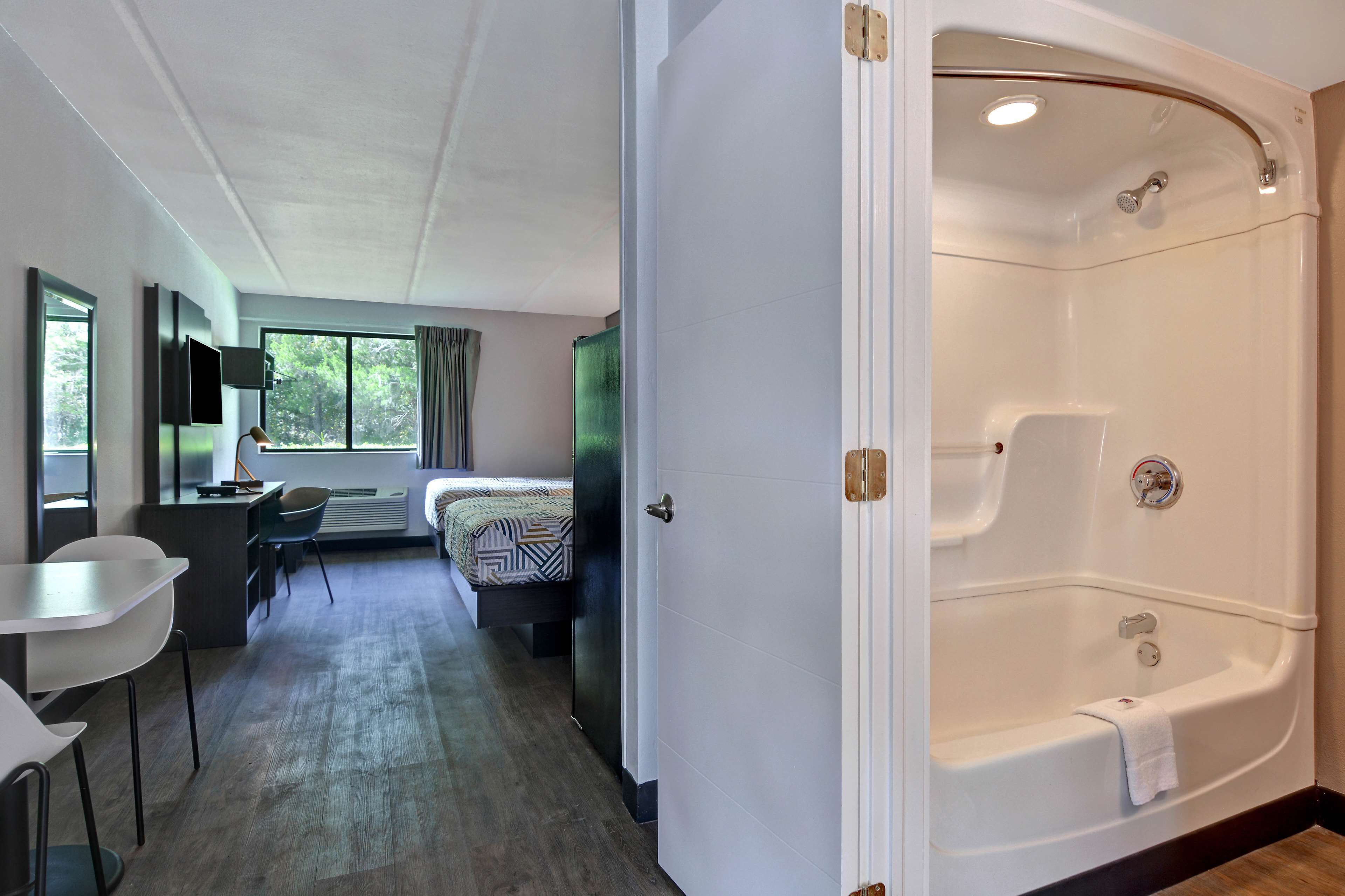 Desk, laptop workspace, free WiFi, bed sheets