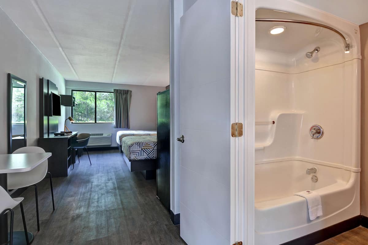 Desk, laptop workspace, free WiFi, bed sheets