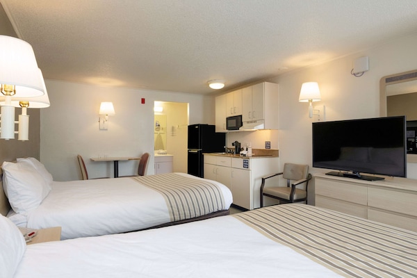 Desk, WiFi (free), alarm clocks, bed sheets