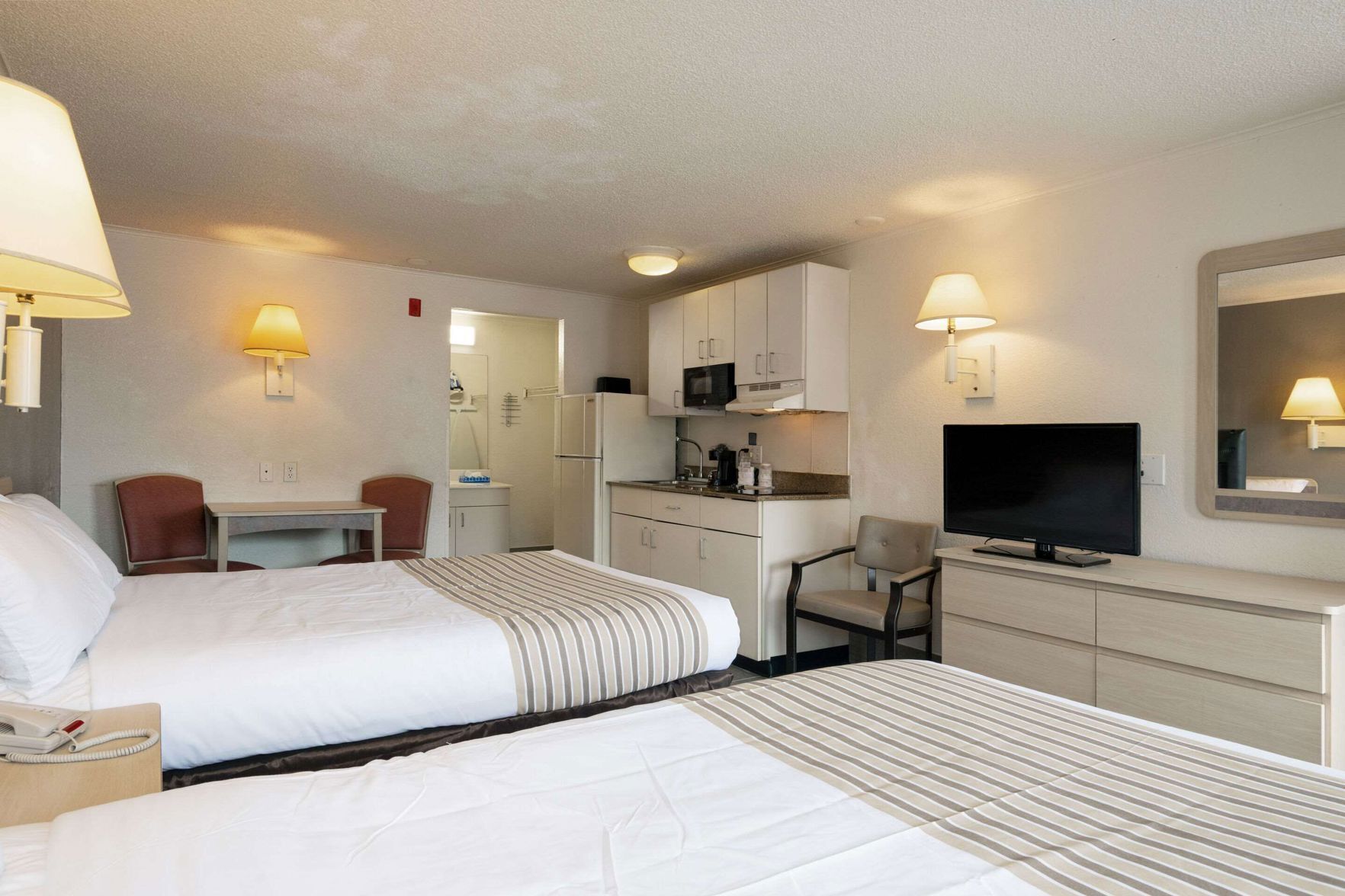 Desk, free WiFi, bed sheets, alarm clocks