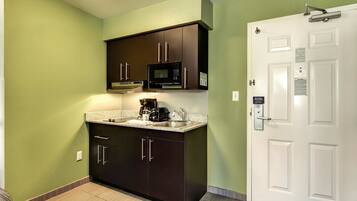 Fridge, microwave, stovetop, coffee/tea maker