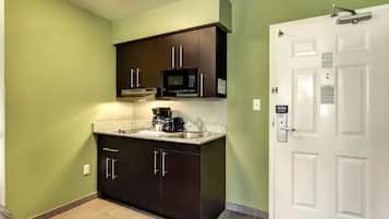 Fridge, microwave, stovetop, coffee/tea maker