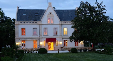 Front of property – evening/night. Manoir de Bellerive