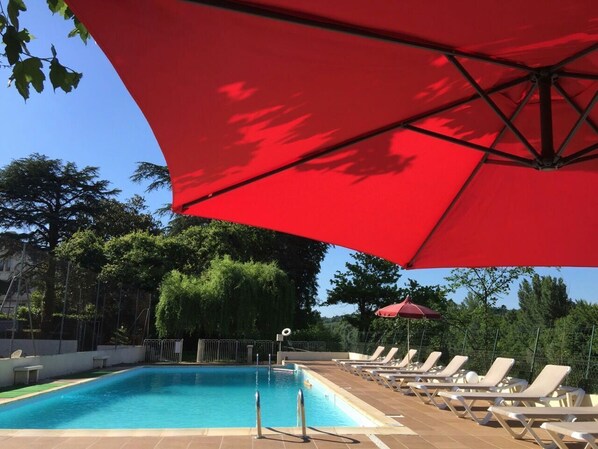 Seasonal outdoor pool, pool umbrellas, pool loungers