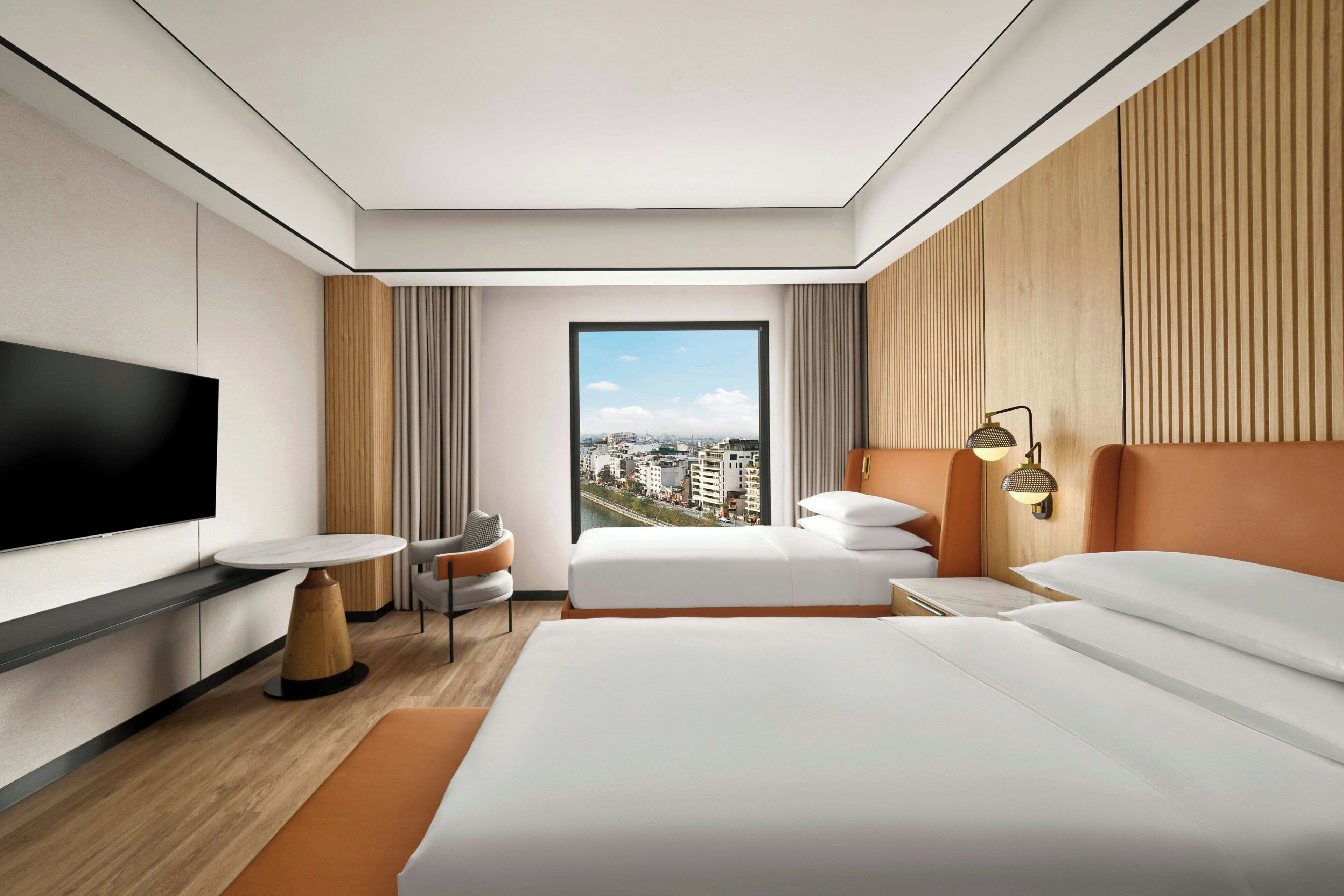 Select Comfort beds, minibar, in-room safe, desk