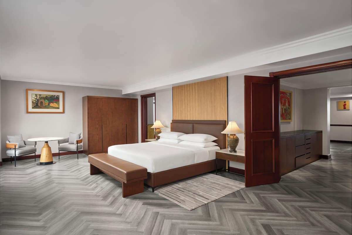 Club Suite, 1 Bedroom | Living room | 37-inch TV with cable channels, fireplace, foosball
