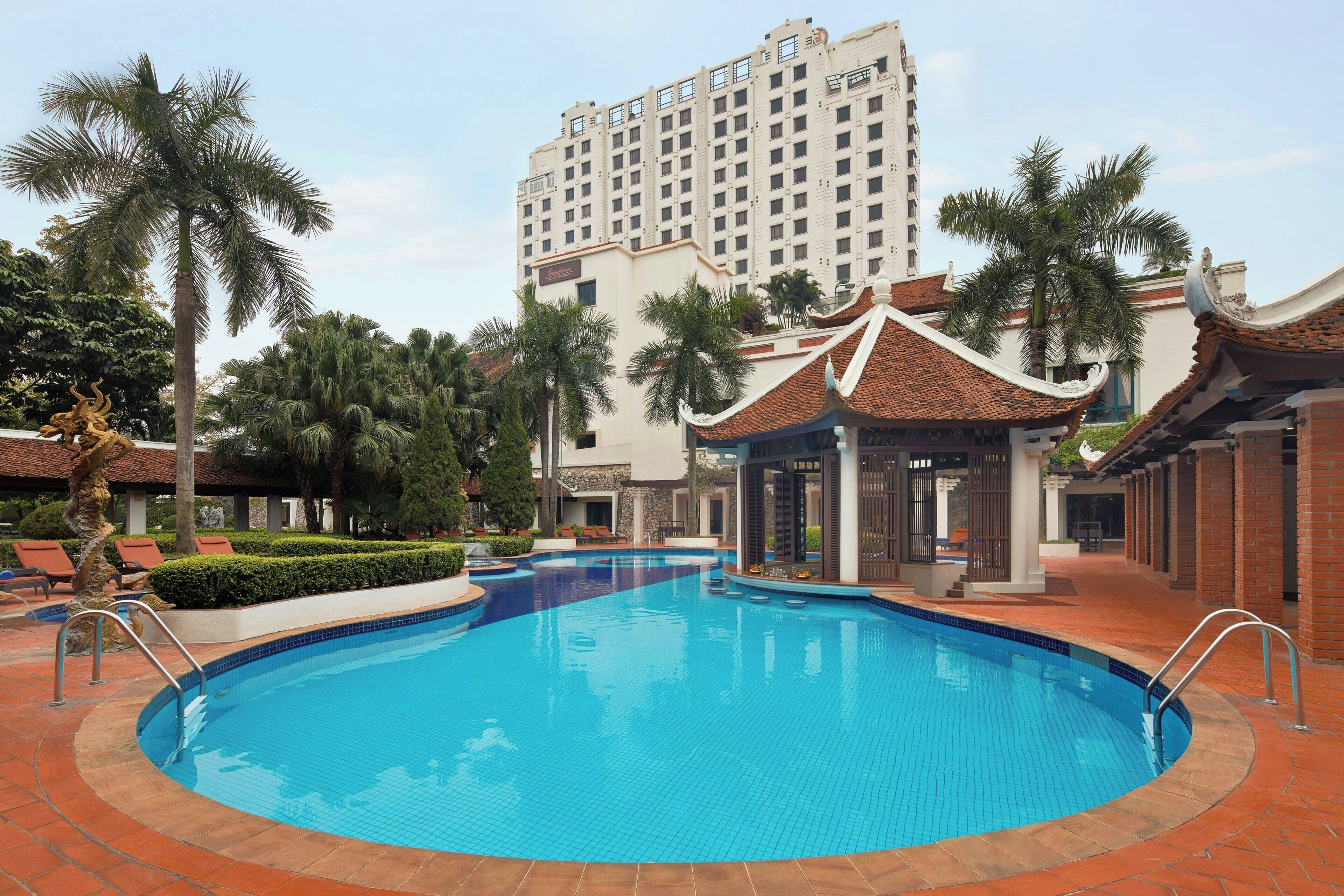 outdoor pool, open 6:00 am to 7:00 pm, pool umbrellas, pool loungers