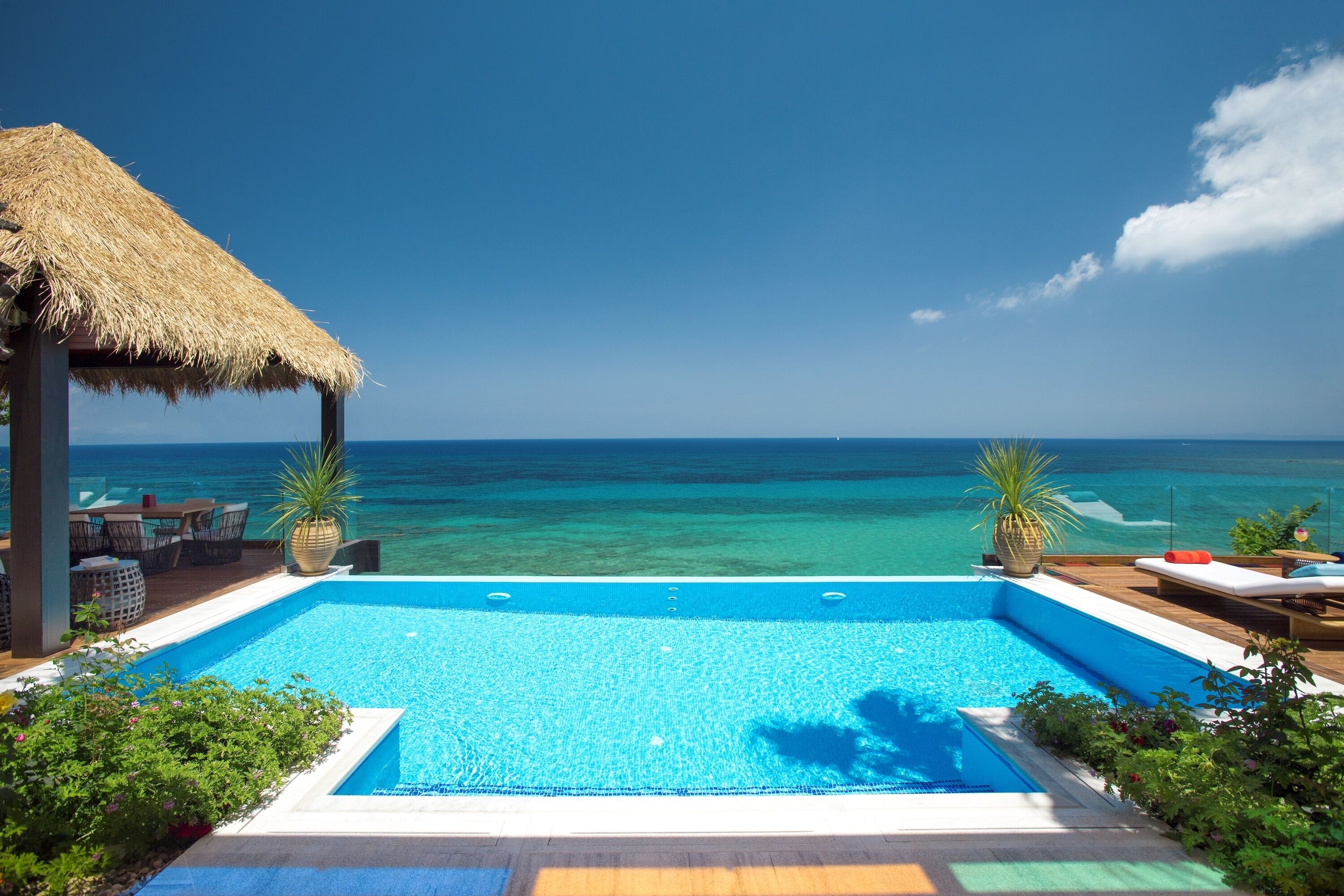 Seasonal outdoor pool, pool umbrellas, pool loungers