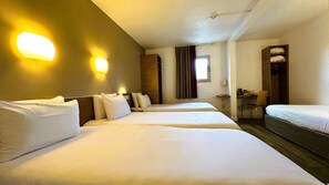 Premium bedding, desk, laptop workspace, blackout curtains